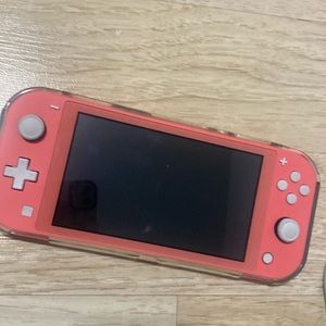 Working brand new Nintendo switch Light with a charger